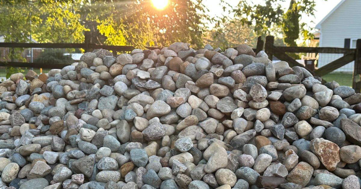Pile of smooth multicolored river rock