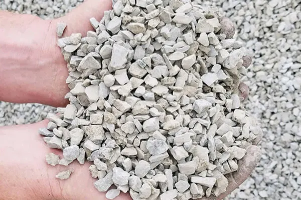 Handful of dime-size clean Limestone #8 gravel